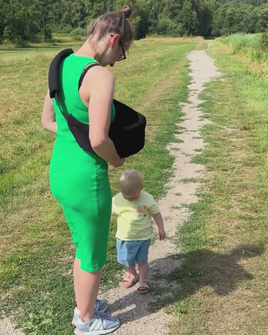 Lumora Sling™ — Smidig bärslinga för korta vardagsstunder